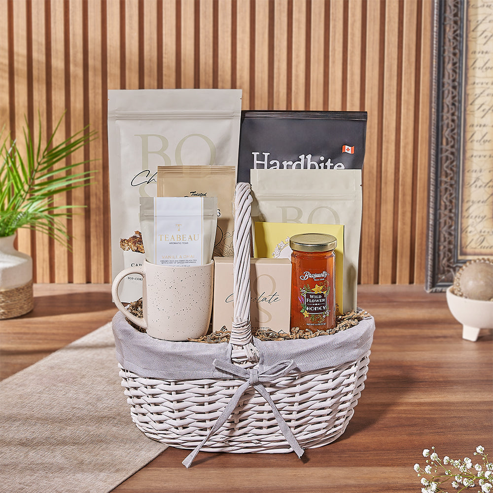 Large White Wicker Basket Featuring Gourmet Snack Collection – how the gift is presented