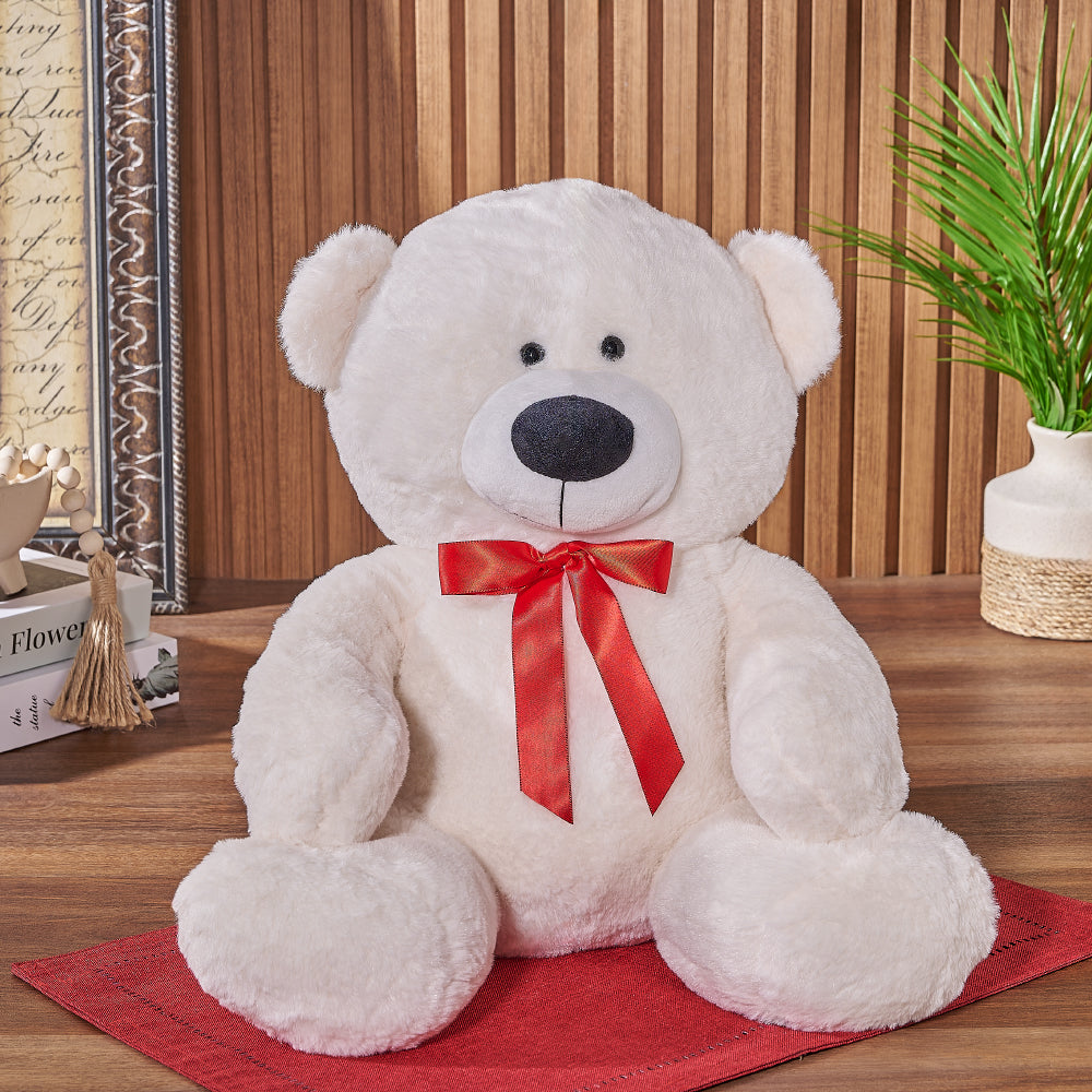 Large Plush Teddy Bear Gift Basket with Red Ribbon – how the gift is presented