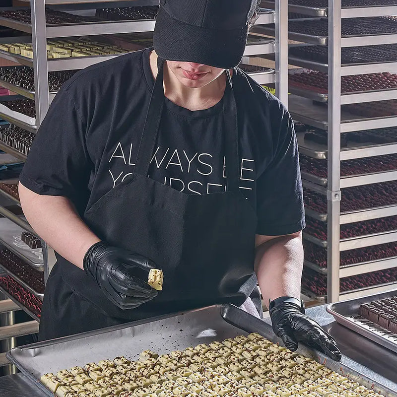 A Canada Baskets team member at work in the kitchen