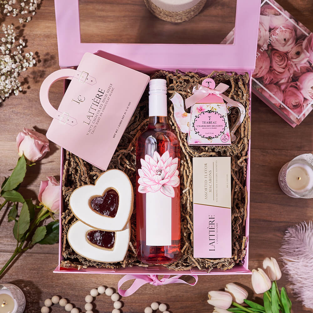 Elegant Wine Gift Basket Featuring Strawberry Delights Tea and Gourmet Sweets – how the gift is presented