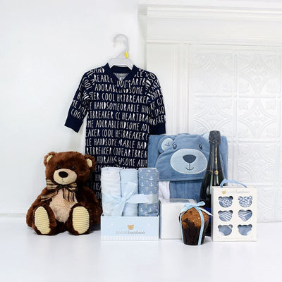 Help someone special welcome their new baby boy with the Tiny Cub Gift Basket. This basket has plenty of items to help the new parents get started with their new arrival, including apparel, handy baby items, a toy, and some celebratory bubbly for the parents to enjoy from Canada Baskets - Canada Delivery